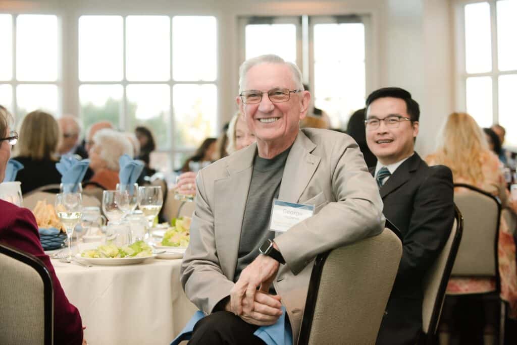 Neighbors Helping Neighbors – 3:  Longtime supporters enjoy learning about St. Jude’s Care for the Poor programs at the Neighbors Helping Neighbors dinner event. (March 2019)
